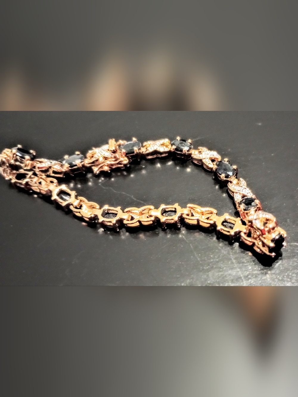 Gold Over sterling Silver (925)Tennis Bracelet 7.5". 12 Oval Blue Saphires 5x4mm